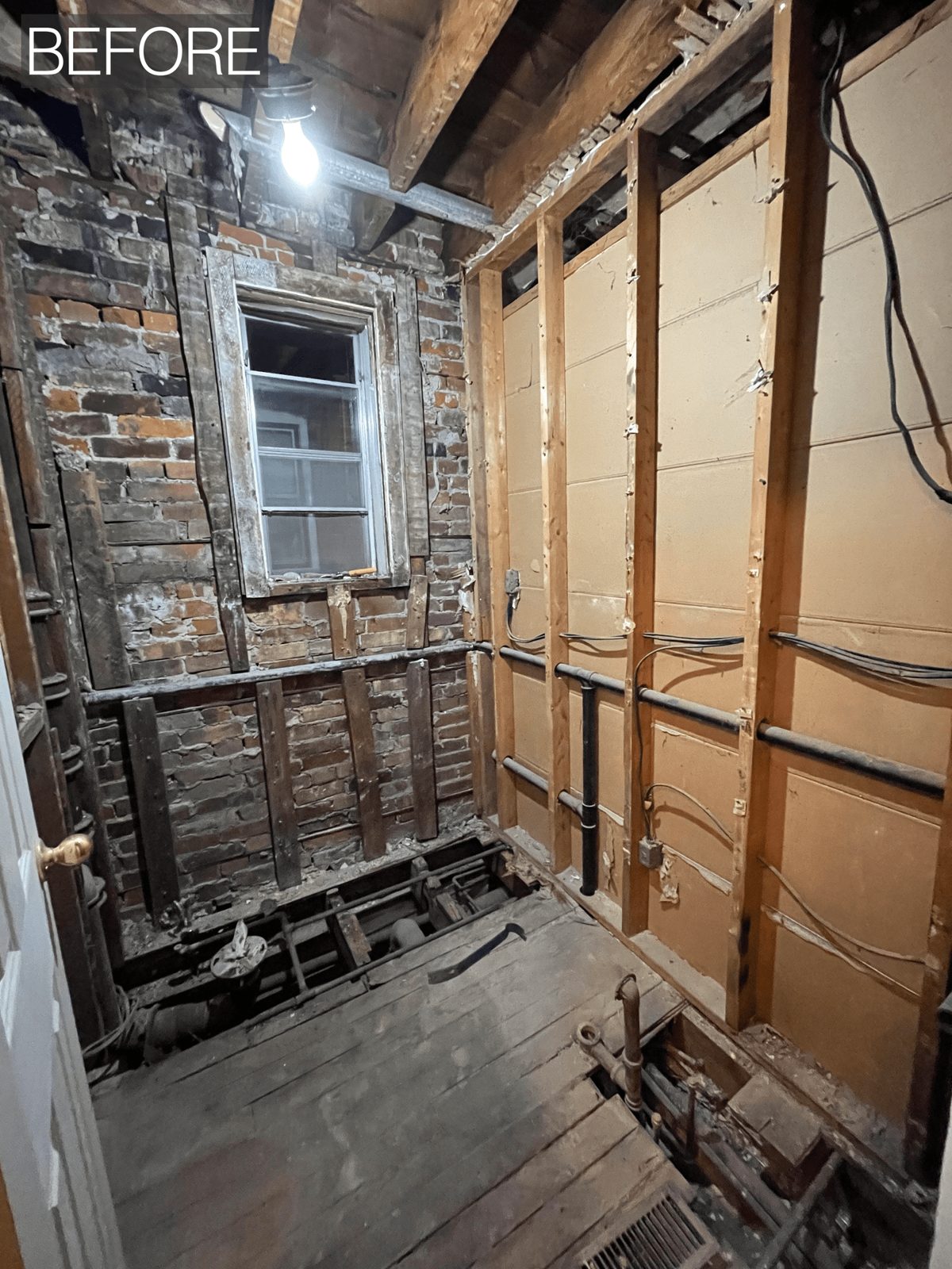 Bright renovated ensuite bathroom in Toronto with light porcelain tile, new vanity and mirrored medicine cabinet, view 4