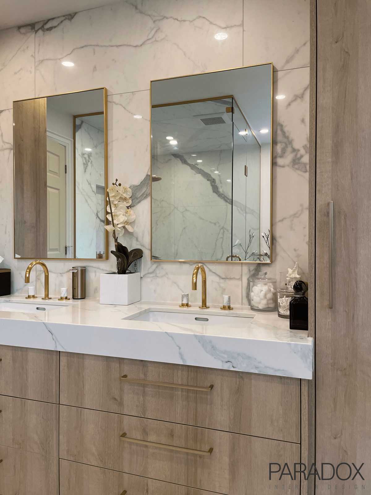 Renovated primary bathroom in Toronto with freestanding soaker tub, oversized steam shower and custom millwork, view 2