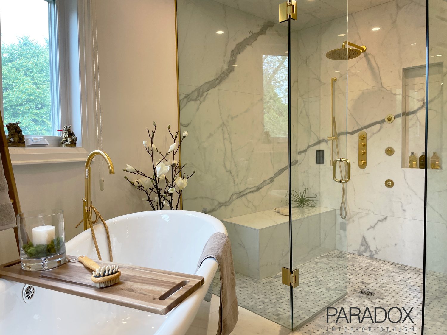 Renovated primary bathroom in Toronto with freestanding soaker tub, oversized steam shower and custom millwork, view 3